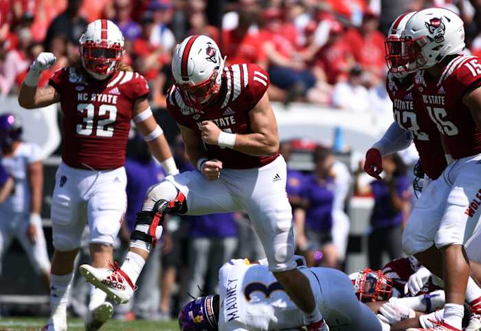 Payton Wilson celebrates a tackle during last State's win against season-opening win against ECU